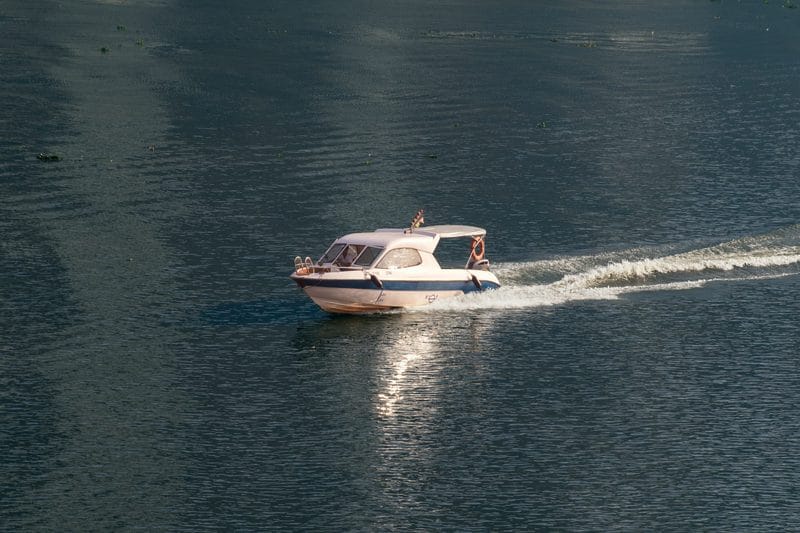 A motorboat cruising on the lake