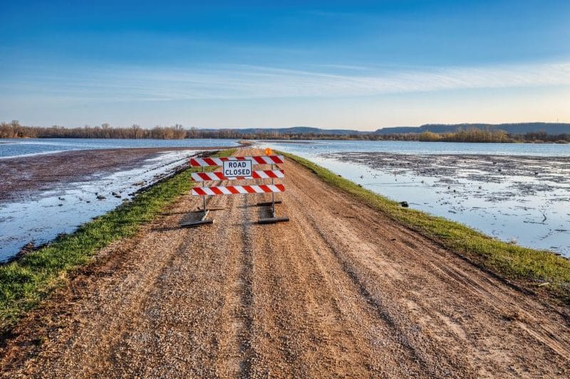 Road closed by flood water in southeastern New Mexico